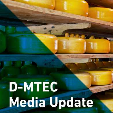 D-MTEC Media Update Title in front of a cheese shelf